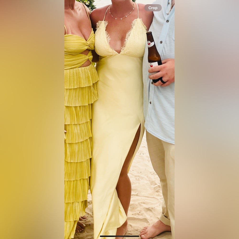 Yellow backless maxi dress. Worn once to wedding. Has been dry cleaned.